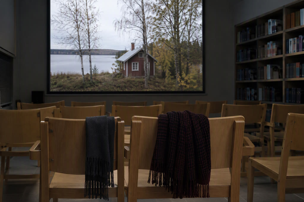 Dokumentinio kino seansui paruošta bibliotekos salė